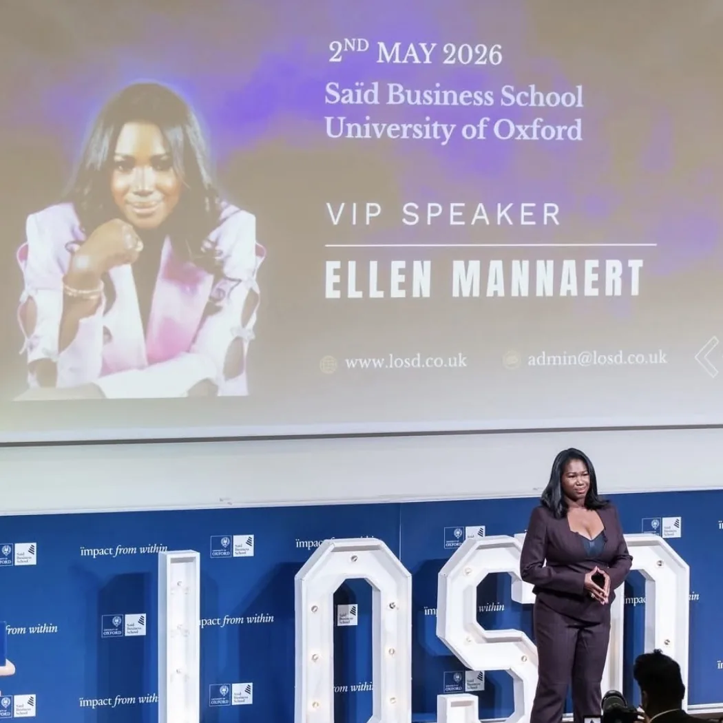 Ellen Mannaert speaking at Saïd Business School, University of Oxford, the screen behind her reading “VIP Speaker, Ellen Mannaert”.